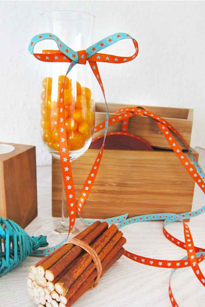 schmales Webband  Sternchen orange-türkis