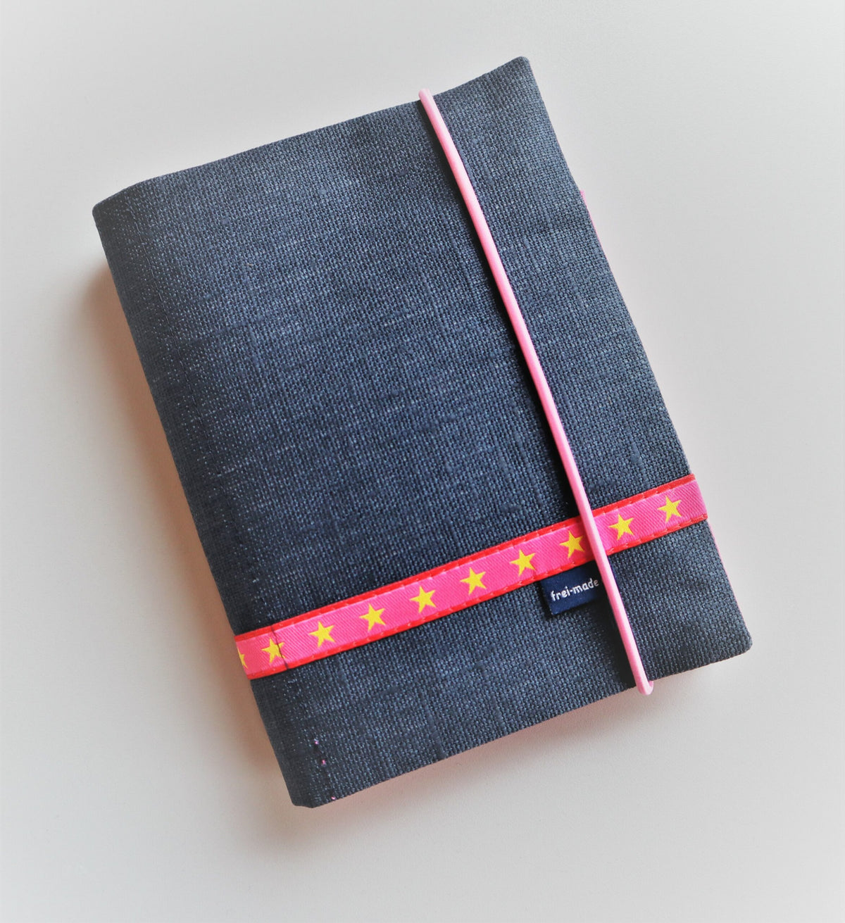 Notizblock dunkelblau Sterne pink
