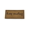 Kunstlederlabel keep smiling